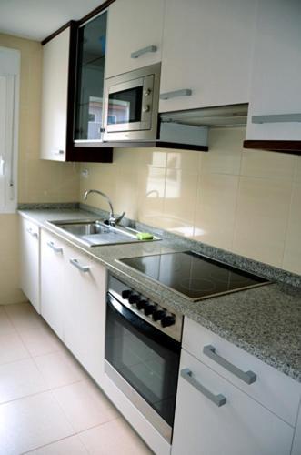 Foto de una habitación de Apartamentos Auhabitat Zaragoza, edificio de apartamentos turísticos con facilidad de parking