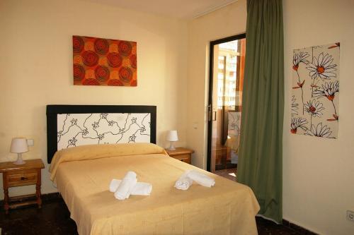 Foto de una habitación de Apartamentos Torre Don Vicente - Arca Rent