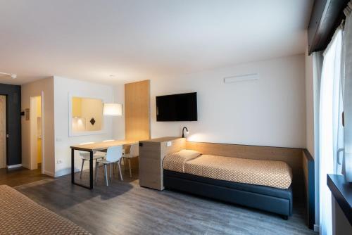 Foto de una habitación de Aparthotel Residence Lastei