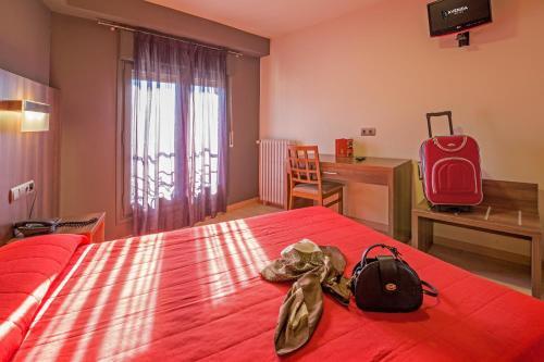 Foto de una habitación de Hotel Avenida