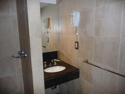 Foto del baño de Altos de Guemes Hotel