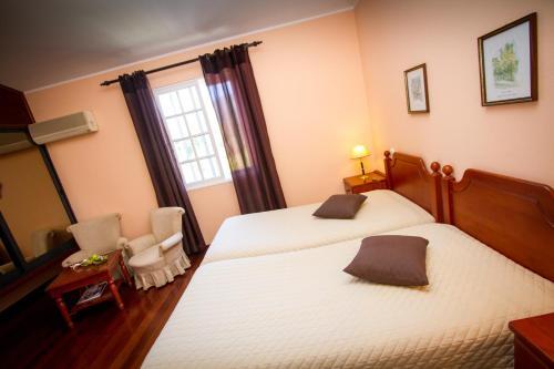 Foto de una habitación de Hotel Rural A Quinta