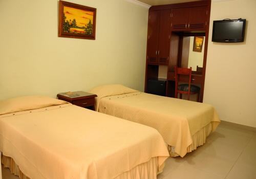 Foto de una habitación de Hotel Napolitano