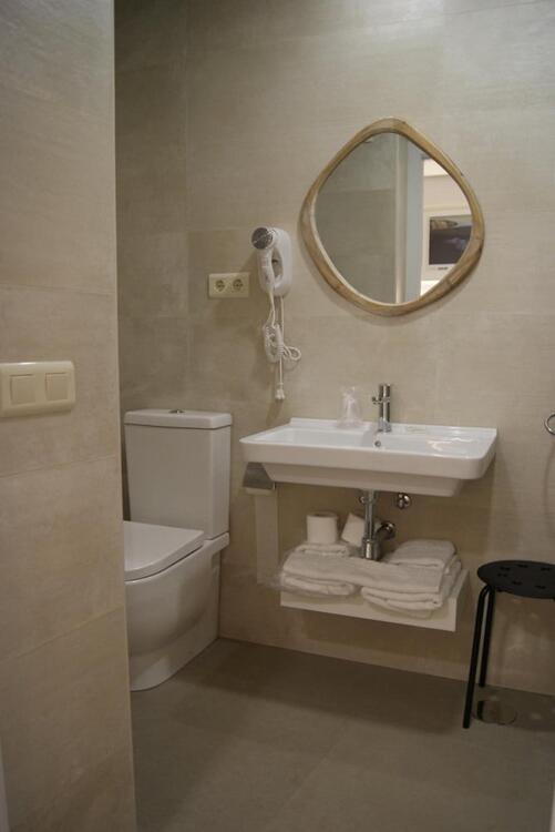 Foto del baño de Hotel La Encomienda