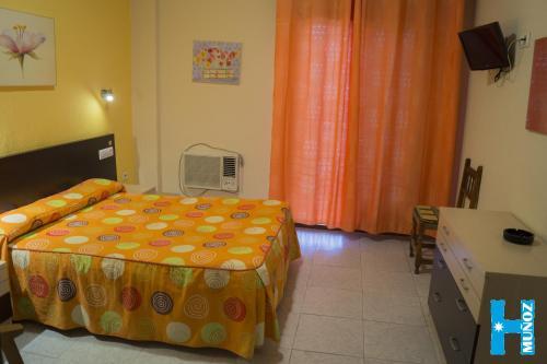 Foto de una habitación de Hotel Muñoz