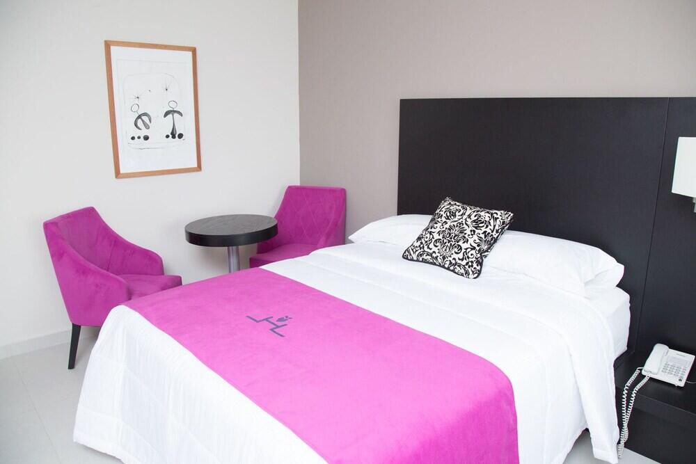 Foto de una habitación de Hoteles HAUS
