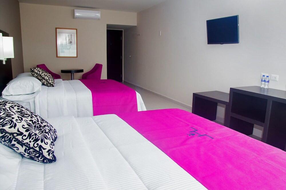 Foto de una habitación de Hoteles HAUS