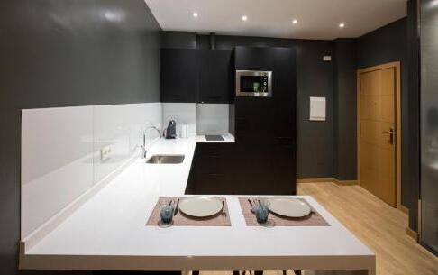 Foto de una habitación de Apartamentos San Justo Plaza