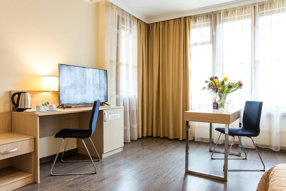 Foto de una habitación de Geneva Hotel