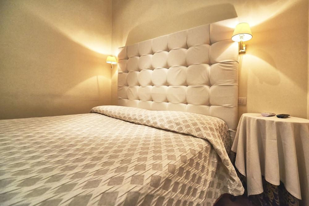 Foto de una habitación de Hotel Condotti 29