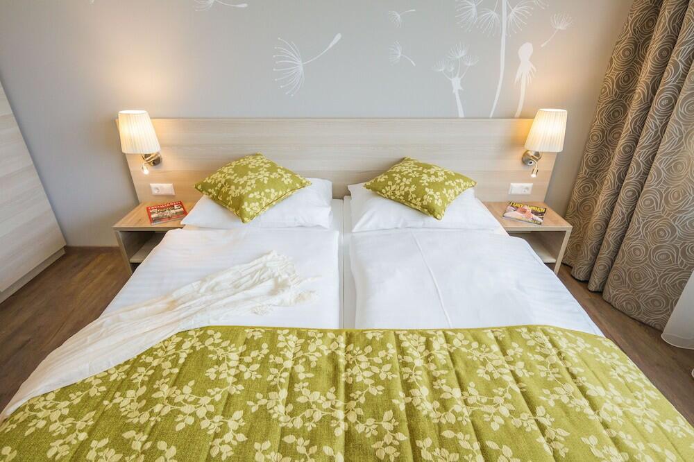 Foto de una habitación de Hotel Das Himberg