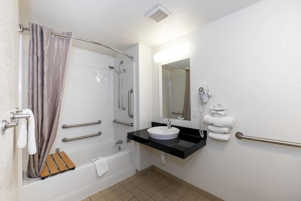Foto del baño de Hotel American Inn