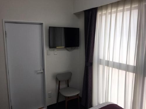 Foto de una habitación de Ueno Urban Hotel