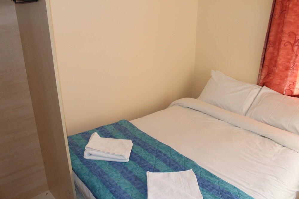 Foto de una habitación de Belgrave House Hotel