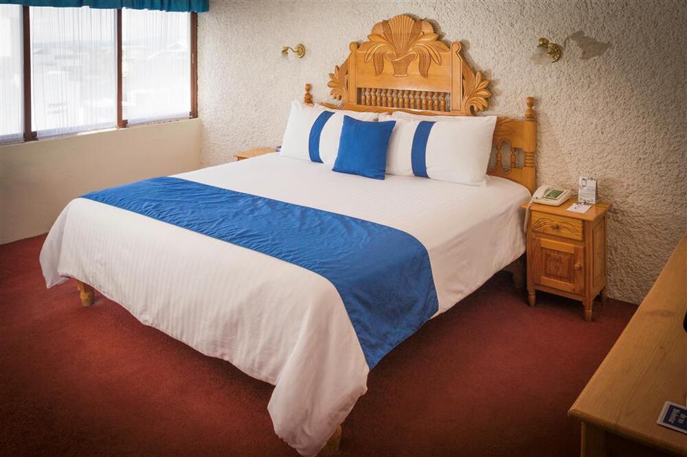 Foto de una habitación de Hotel Del Angel