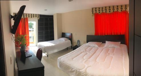Foto de una habitación de Hotel Continental Express