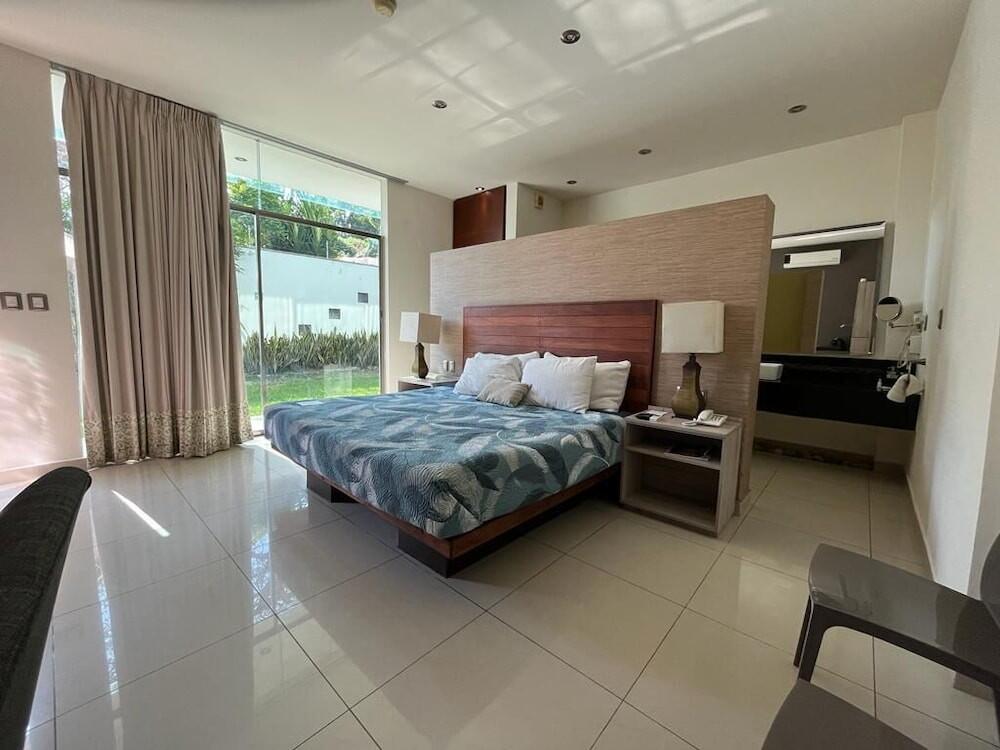 Foto de una habitación de Amoe Hotel Boutique &amp;amp; Spa