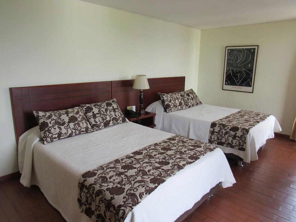 Foto de una habitación de Hotel Don Lolo