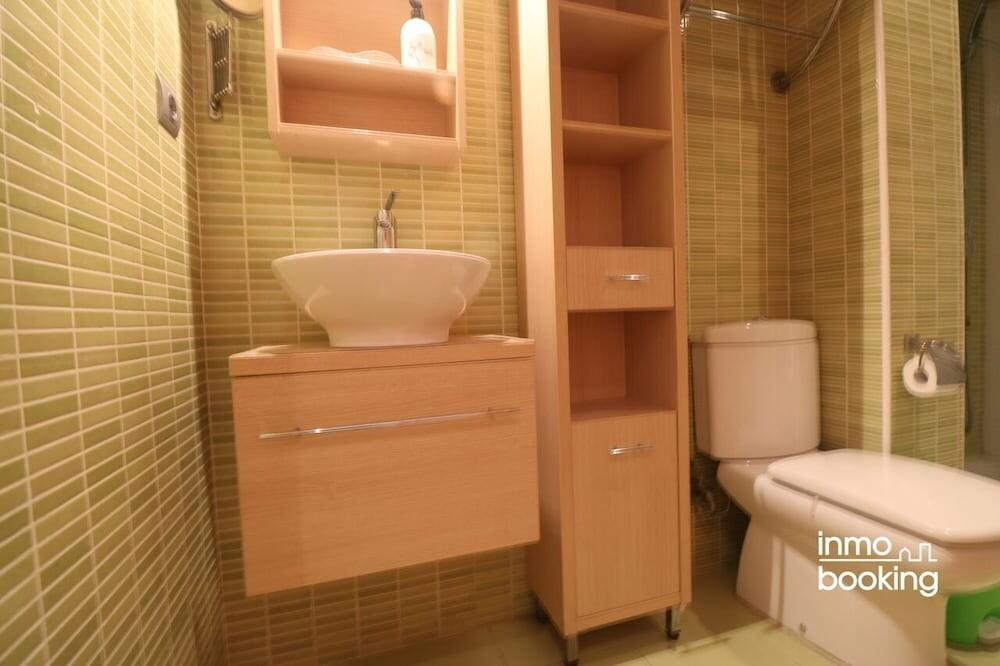 Foto del baño de InmoBooking Disseny Apartments