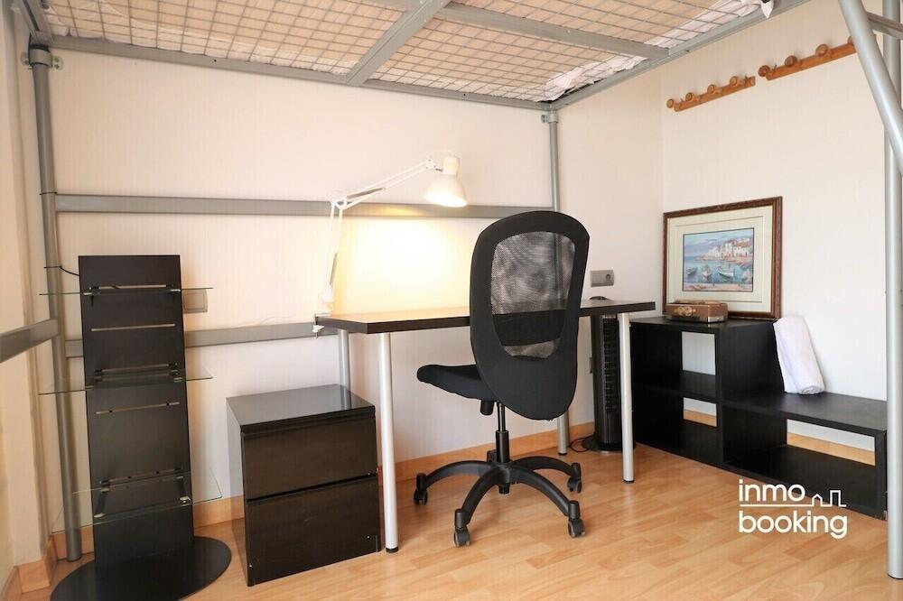 Foto de una habitación de InmoBooking Disseny Apartments