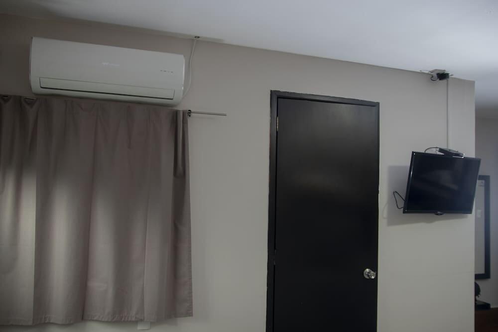 Foto de una habitación de Hotel HAUS Express