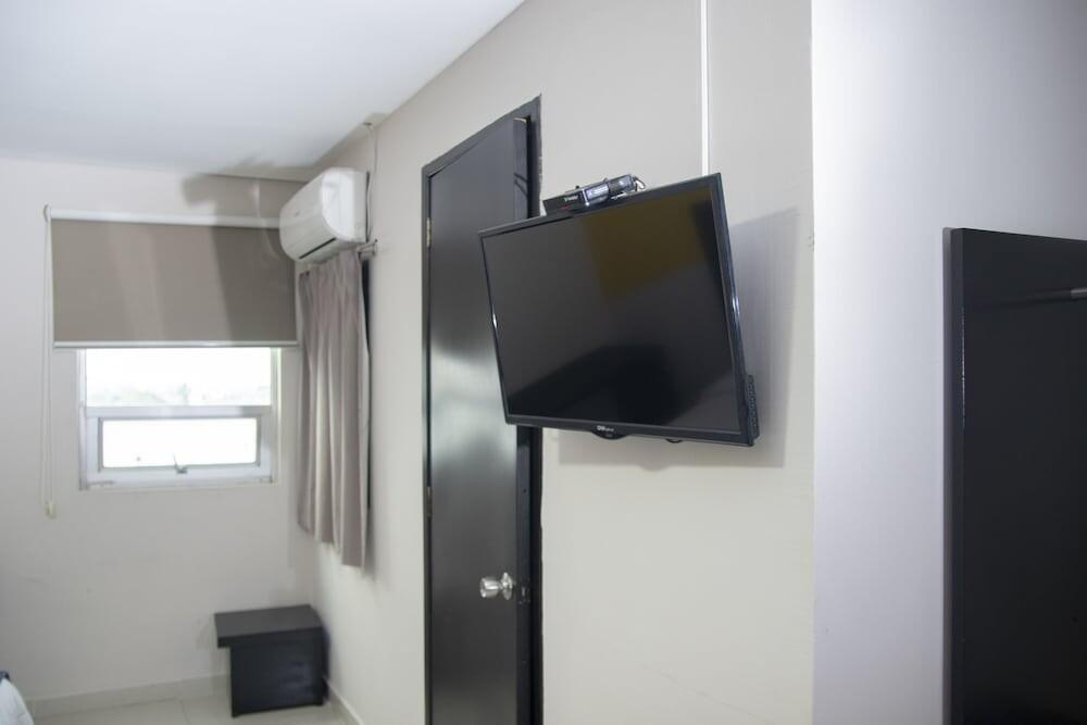 Foto de una habitación de Hotel HAUS Express
