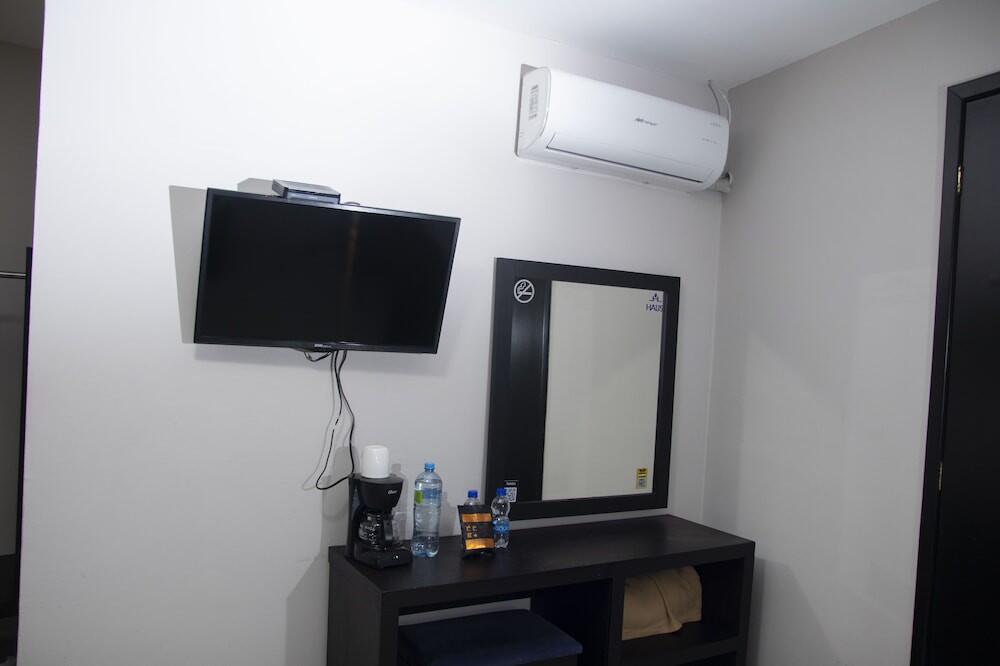 Foto de una habitación de Hotel HAUS Express