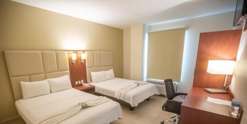 Foto de una habitación de Hotel Ave Inn