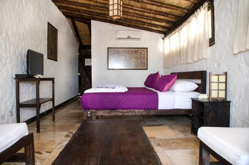 Foto de una habitación de Las Cabañas de Antica