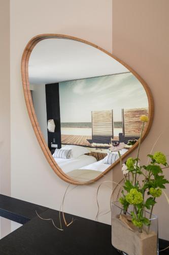 Foto de una habitación de Hôtel &amp;amp; Spa Les Bains d&amp;#039;Arguin by Thalazur