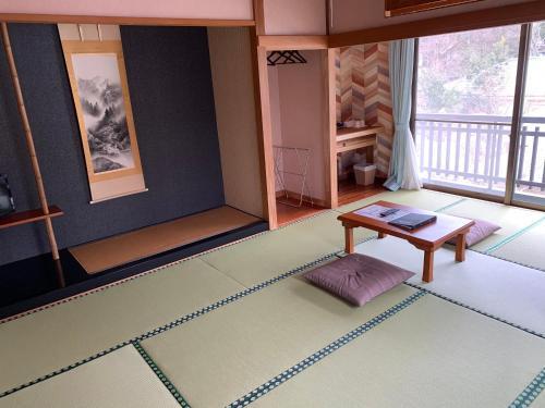 Foto de una habitación de Onsen &amp;amp; Garden -Asante Inn-