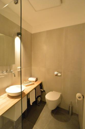 Foto del baño de Grey House Apartments Grossbeeren