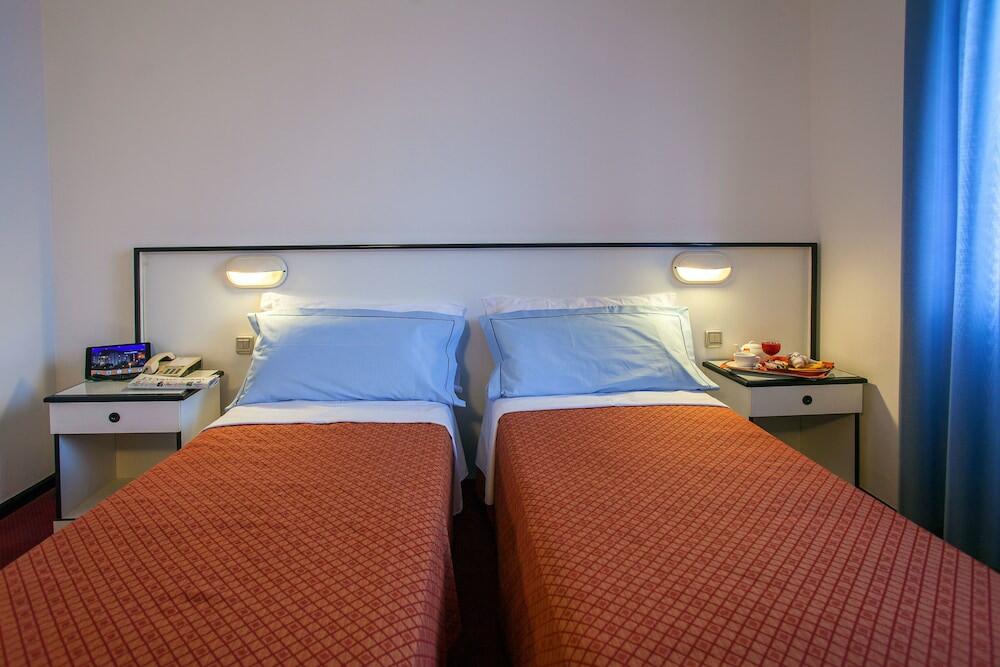 Foto de una habitación de Hotel Quadrifoglio
