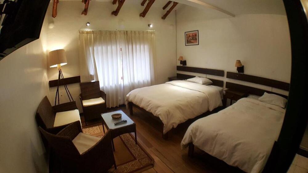 Foto de una habitación de Hotel KILLA HOUSE