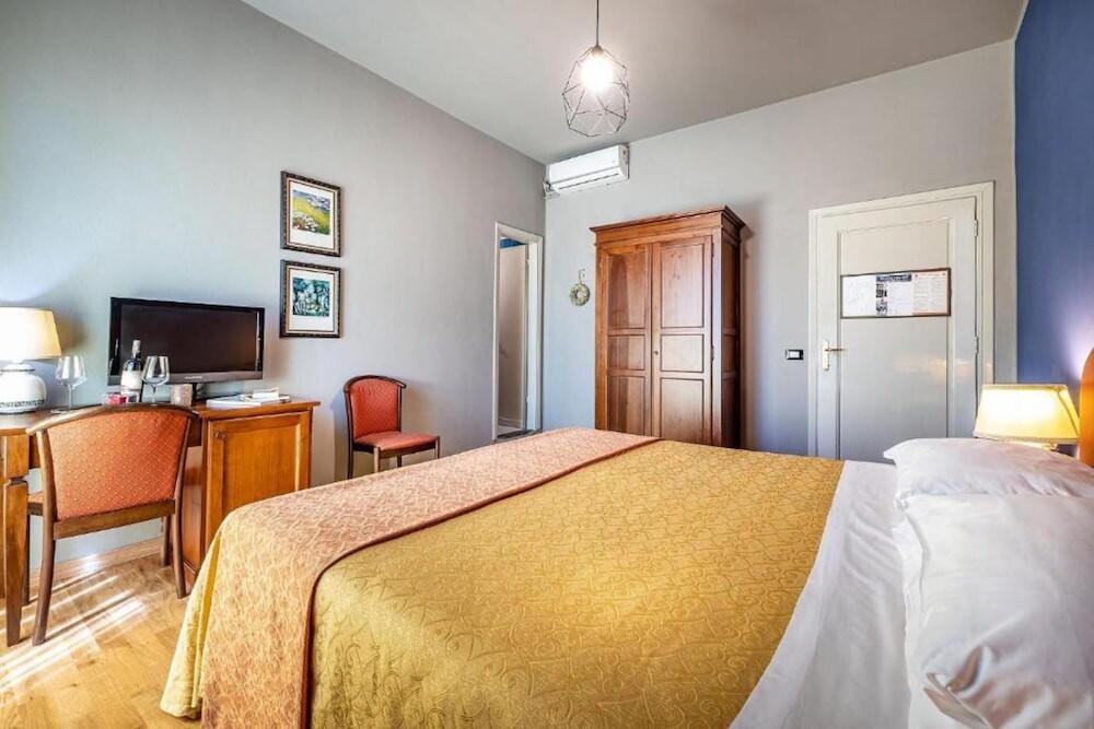 Foto de una habitación de Hotel Villani