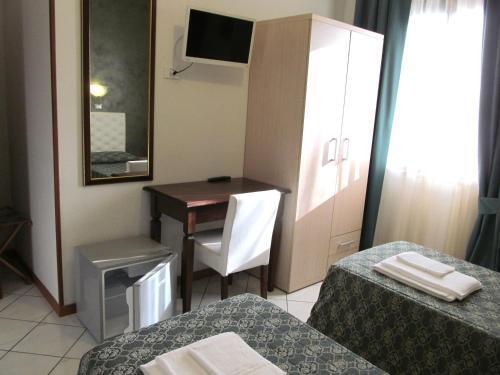Foto de una habitación de Hotel Romagna