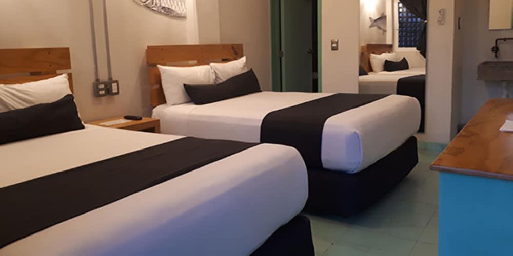 Foto de una habitación de Mas Basico Hotel
