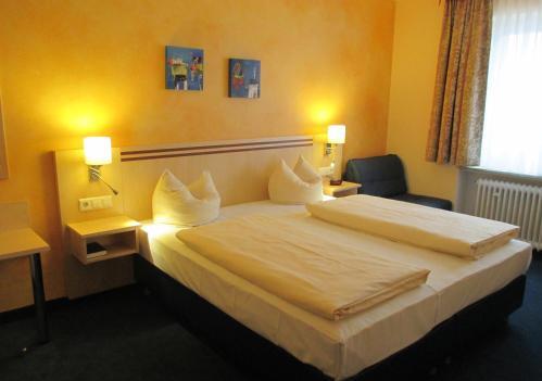 Foto de una habitación de Hotel Apollo Garni