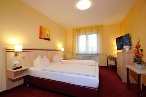 Foto de una habitación de Hotel Apollo Garni