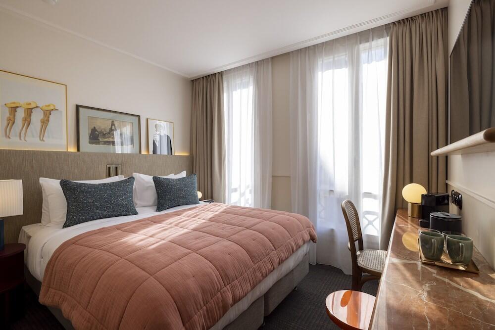 Foto de una habitación de Hotel Troyon